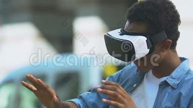 兴奋的非裔美国青少年使用VR耳机，现代技术，未来